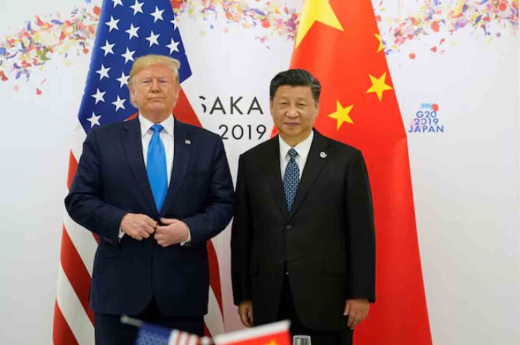 U.S. President Donald Trump poses for a photo with China's President Xi Jinping before their bilateral meeting during the G20 leaders summit in Osaka, Japan.