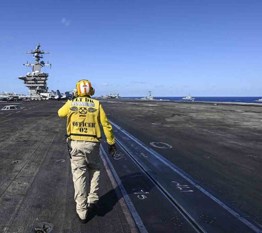 A crew member works on the deck of the USS Carl Vinson aircraft carrier during an earlier maritime exercise in the Philippine Sea.