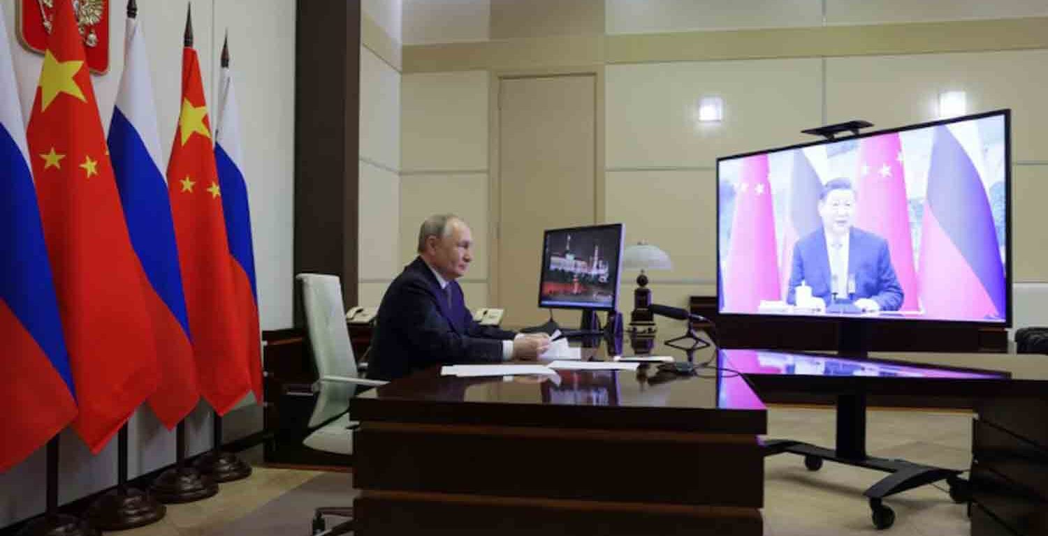 Russian President Vladimir Putin holds a video conference meeting with Chinese President Xi Jinping at the Novo-Ogaryovo state residence outside Moscow, Russia.