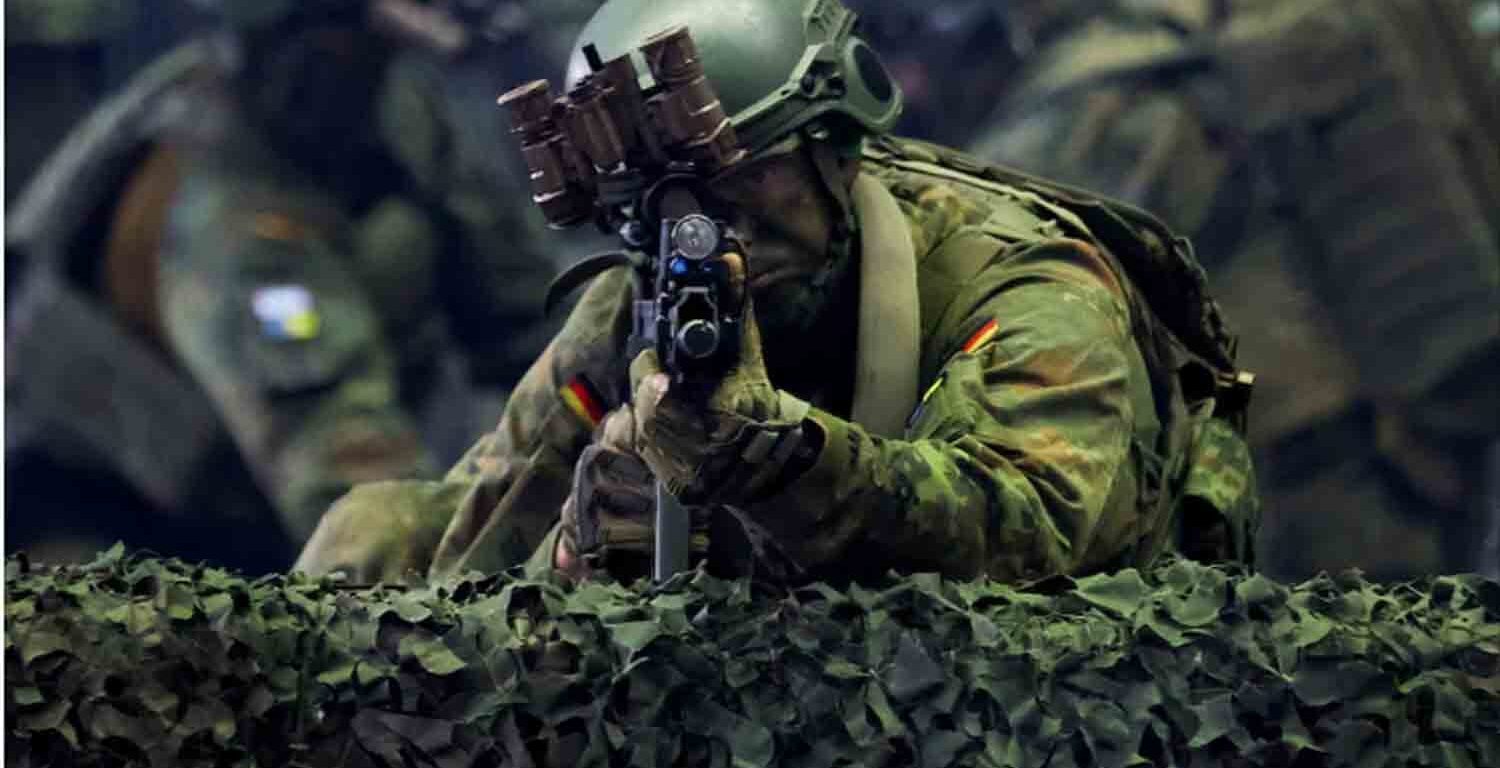 A member of German army Bundeswehr exercises during a presentation to German Defence Minister Boris Pistorius during his visit to the airborne brigade of German army Bundeswehr in Saarlouis, Germany.