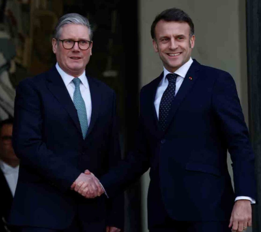 French President Emmanuel Macron welcomes Britain's Prime Minister Keir Starmer as he arrives for a meeting with European leaders on Ukraine and European security at the Elysee Palace in Paris, France.