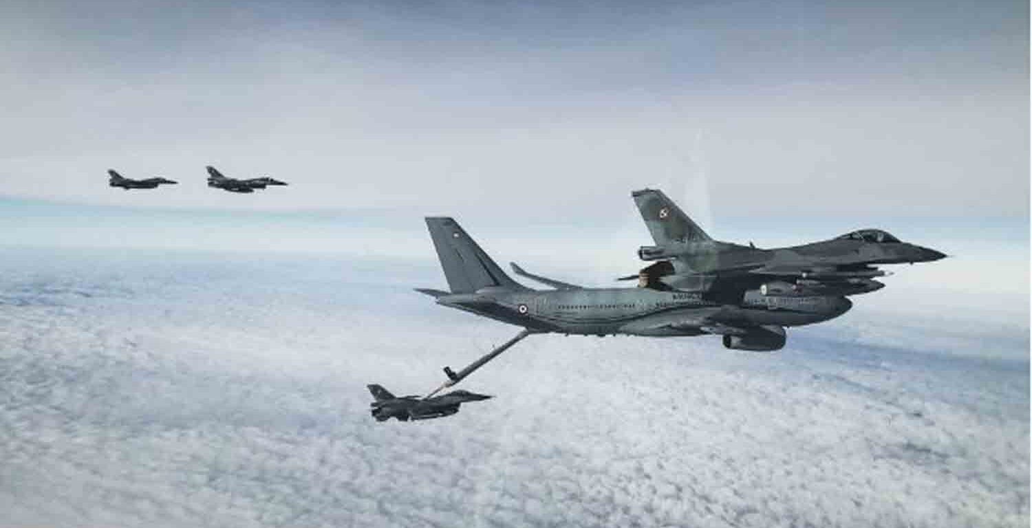 French A330 tanker refuels Polish F-16 fighters in aerial ops.