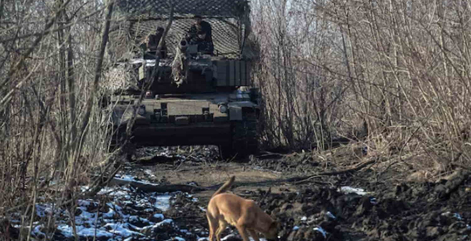 Servicemen of the 5th Separate Heavy Mechanised Brigade of the Ukrainian Armed Forces drive in a Leopard 1A5 tank, amid Russia's attack on Ukraine.