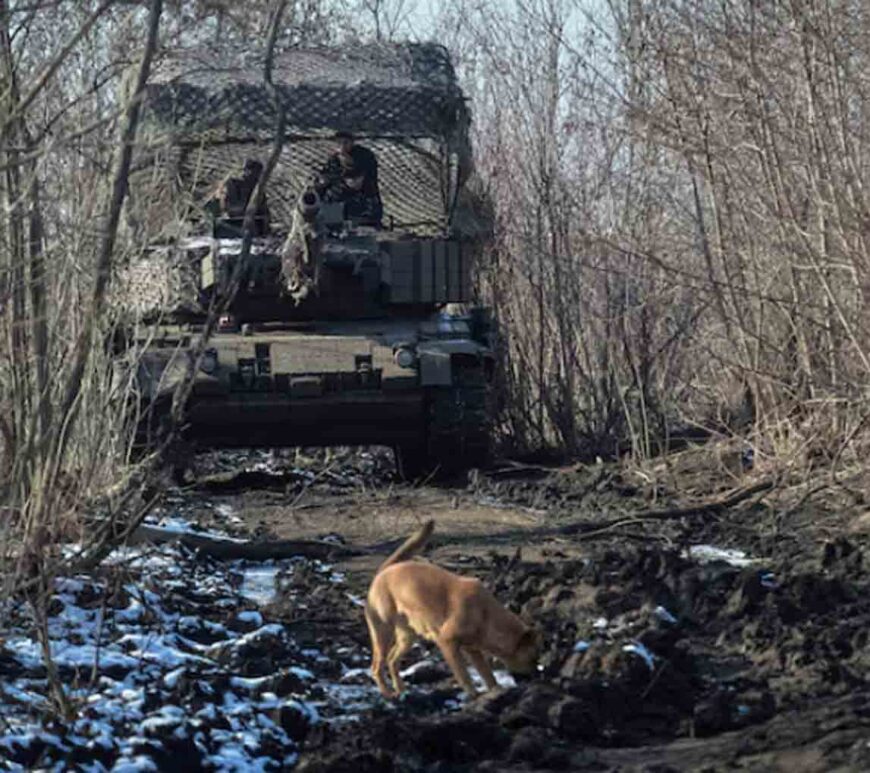 Servicemen of the 5th Separate Heavy Mechanised Brigade of the Ukrainian Armed Forces drive in a Leopard 1A5 tank, amid Russia's attack on Ukraine.