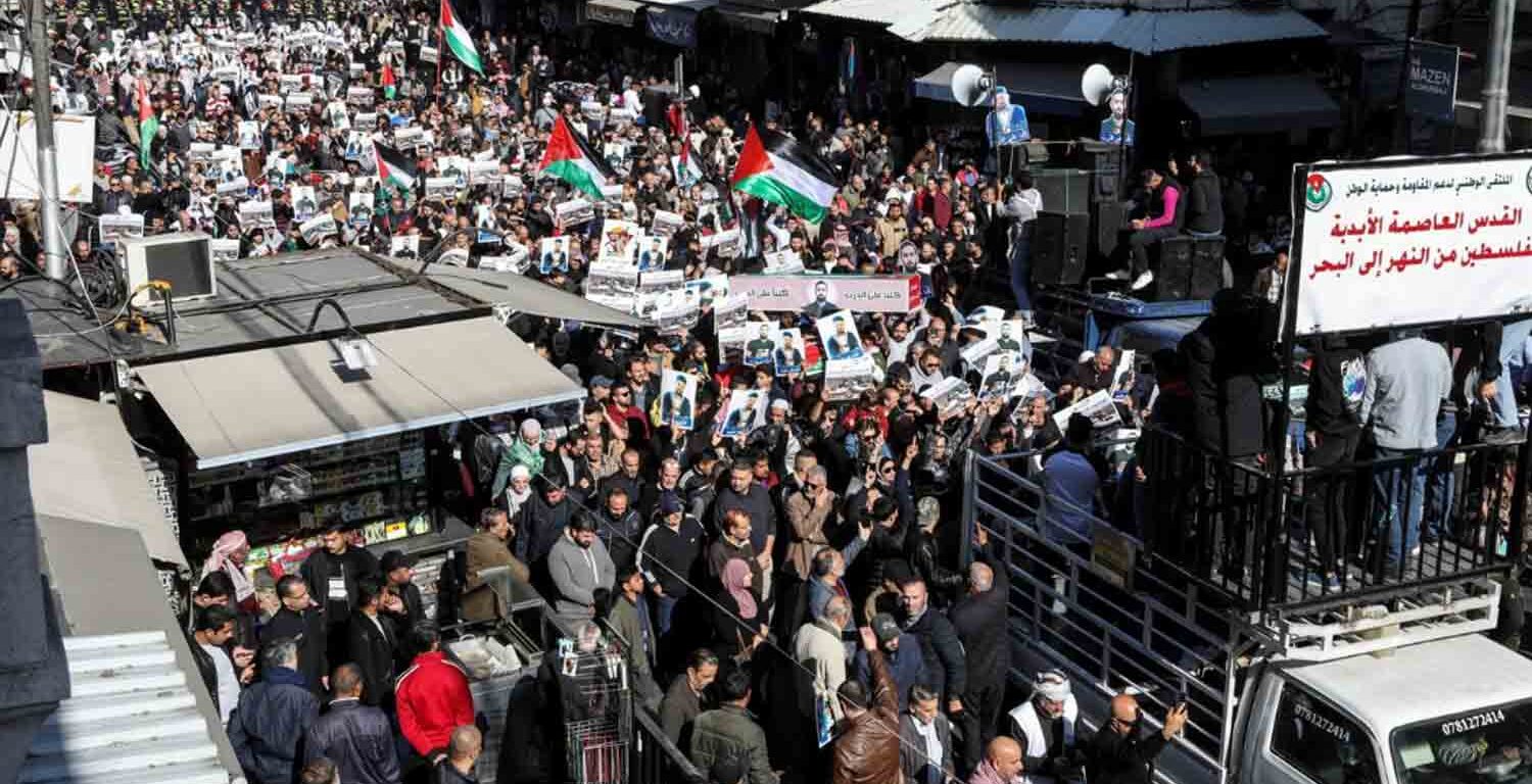 Jordanians protest in solidarity with Palestinians in the Jordanian capital Amman.