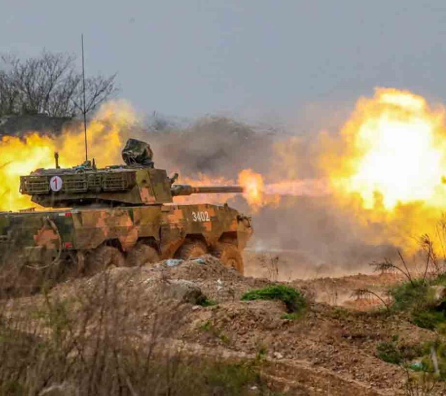 An assault vehicle unit carries out a fire strike during actual combat training in Ningbo, China.