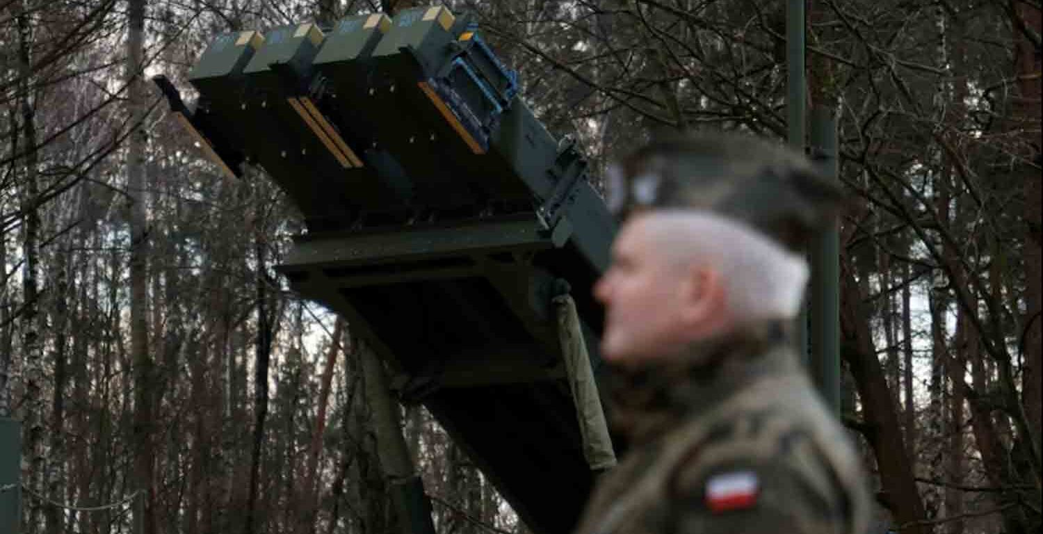 Polish army general stands in front of the surface-to-air missile launcher, the Patriot (Wisla) system, newly added into the Integrated Battle Command System (IBCS) at an army base in Sochaczew, Poland.