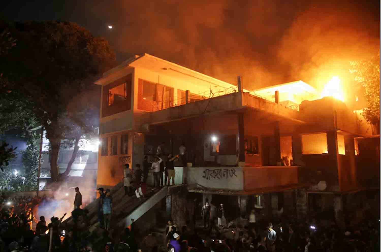 Bangladesh protesters torch ousted PM Hasina’s father’s home