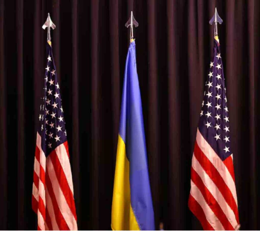 Ukraine and American flags are seen inside the conference room at Ramstein airbase in Germany.