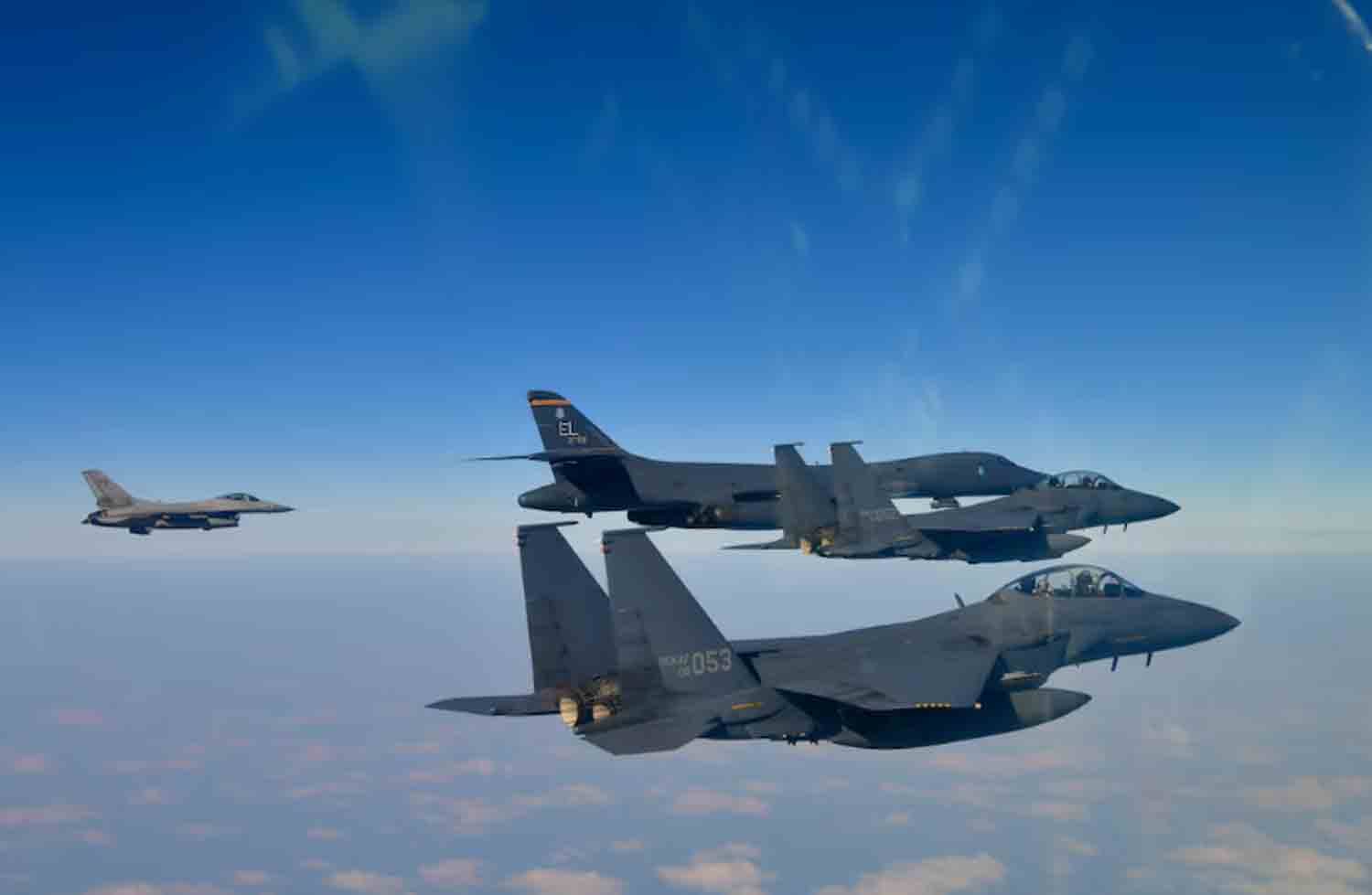 United-States-and-South-Korea-aerial-exercise A U.S. Air Force B-1B bomber, top second from left, and South Korean Air Force F-15K fighter jets, right bottom, conduct a joint aerial drill over the Korean Peninsula on Thursday.