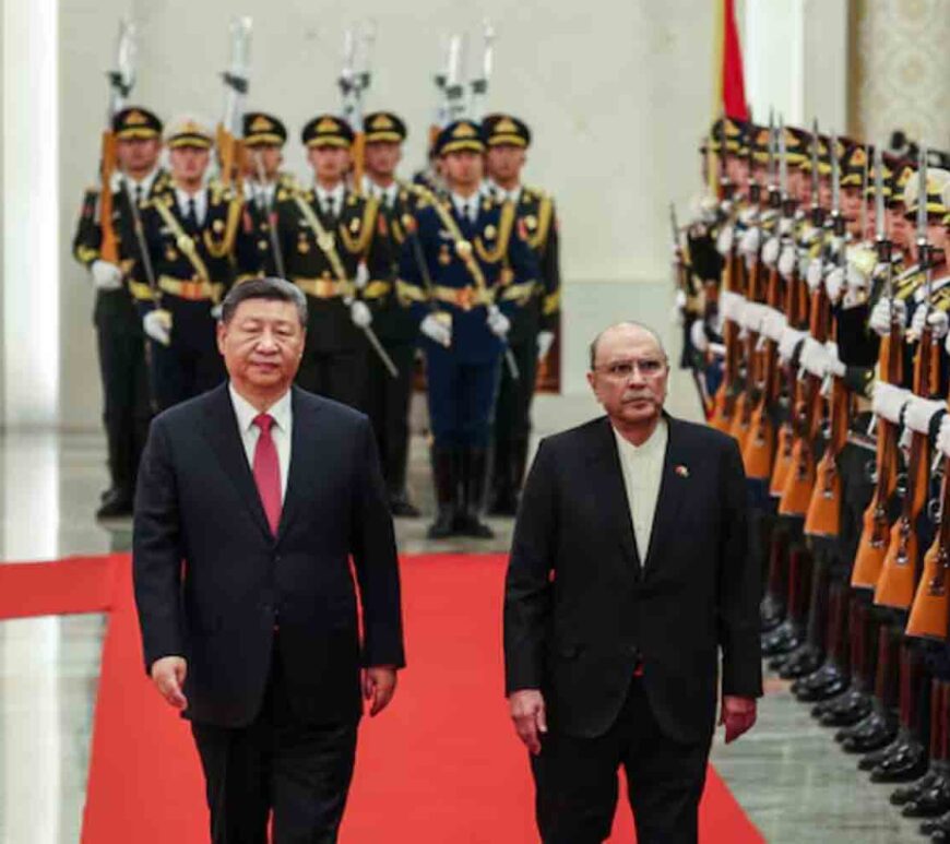 Chinese President Xi Jinping and Pakistani President Asif Ali Zardari walk past the honor guards during the welcome ceremony at the Great Hall of the People in Beijing, China.