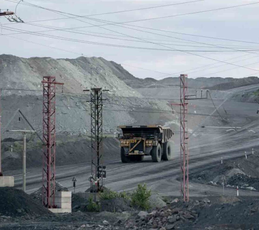 A dumper truck shifts iron ore from an excavation site near Horishni Plavni, Ukraine.