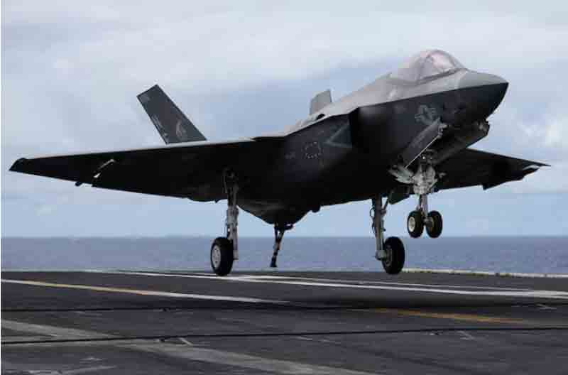 F-35 jet lands on the USS Carl Vinson aircraft carrier during the Rim of the Pacific (RIMPAC) military exercises about 100 miles south of Oahu, Hawaii, U.S.