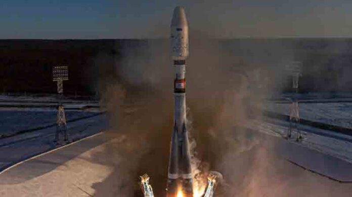 In this photograph distributed by the Russian state agency Sputnik, a Russian Soyuz-2.1b rocket with a Fregat upper stage carrying two Ionosfera-M satellites and an additional payload of 53 Russian and foreign mini-satellites blasts off from the launchpad at the Vostochny Cosmodrome in Amur Region, Russia.