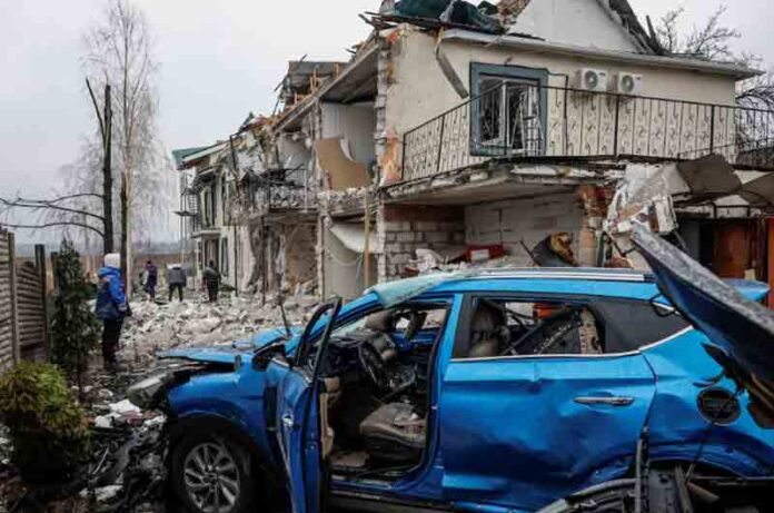 View shows damaged private houses and car at a site of a Russian drone strike, amid Russia's attack on Ukraine, in the town of Hostomel, Kyiv region, Ukraine