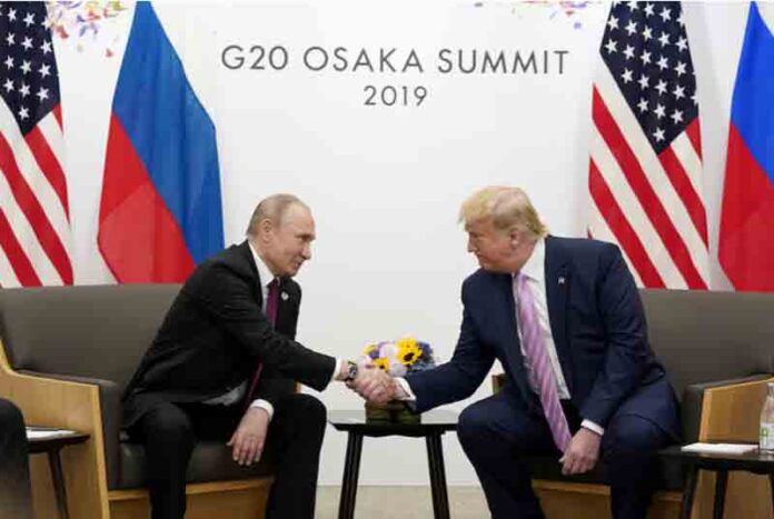 Vladimir-Putin-and-U.S.-President-Donald-Trump Russia's President Vladimir Putin and U.S. President Donald Trump shake hands during a bilateral meeting at the G20 leaders summit in Osaka, Japan.