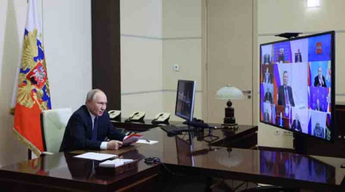 Vladimir-Putin-chairs-a-security-council-meeting-via-videoconference Russia's President Vladimir Putin chairs a security council meeting via videoconference at the Novo-Ogaryovo state residence outside Moscow.