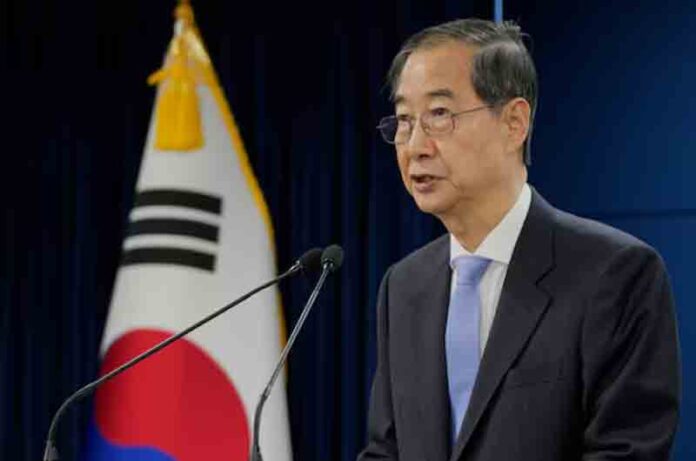 South Korean acting President Han Duck-soo speaks during a briefing at the Government Complex in Seoul, South Korea.