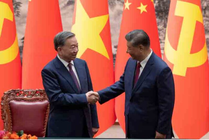 Chinese President Xi Jinping and Vietnam's President To Lam shake hands after a signing ceremony at the Great Hall of the People in Beijing, China.