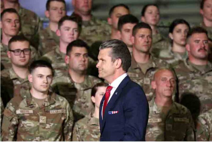 U.S. Defense Secretary Pete Hegseth walks during an event at Selfridge Air National Guard Base in Harrison Township, Michigan, U.S.