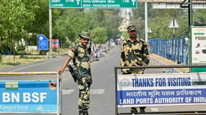 Indian Border Security Force personnel stand guard near the India-Pakistan Wagah border post.