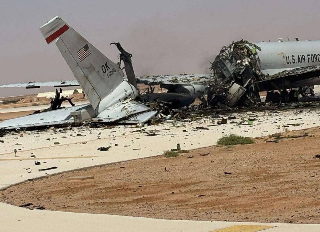 The wreckage of a US Air Force E-3 Sentry airborne warning and control aircraft sits on the tarmac at an air base in Saudi Arabia.