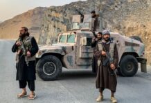 Trump Administration Labels Afghanistan State Sponsor of Wrongful Detention Taliban security personnel stand guard near the Torkham border crossing between Afghanistan and Pakistan in the Nangarhar province.