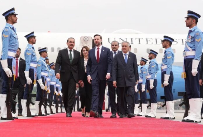 US Vice President JD Vance walks with Pakistani officials after arriving for talks with Iran in Islamabad, Pakistan