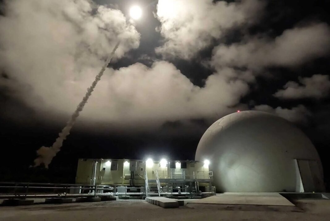The Aegis Guam System acts like a high-tech protective umbrella over the island of Guam, using advanced sensors and missiles to detect and stop incoming Chinese missile threats before they can hit the ground.