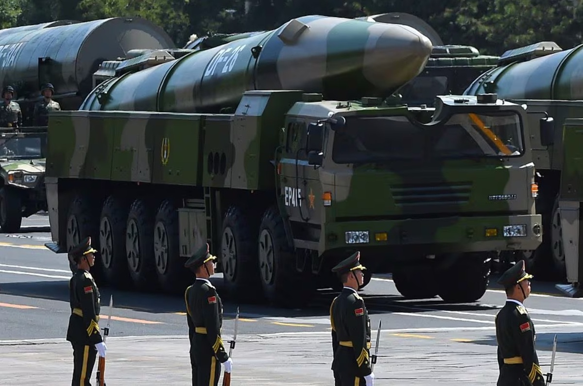 Military vehicles carrying DF-26 ballistic missiles participate in a military parade at Tiananmen Square in Beijing on Sept. 3, 2015.