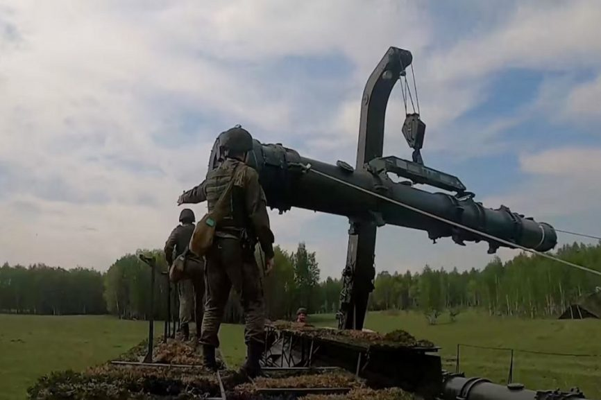 Russia on Wednesday showed what it said was footage of troops delivering nuclear warheads to mobile Iskander-M missile launch systems, loading them and moving them to launch sites as part of a major nuclear exercise.