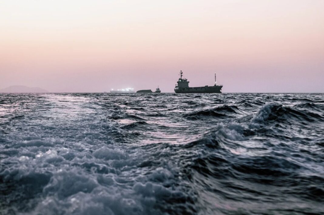 Oil tankers and cargo vessels remain anchored off Port Sultan Qaboos in Muscat, Oman, on June 21.