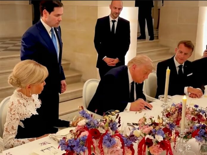 US President Donald Trump signs Iran-US MoU in Versailles. US President Donald Trump signs Iran-US MoU in Versailles.